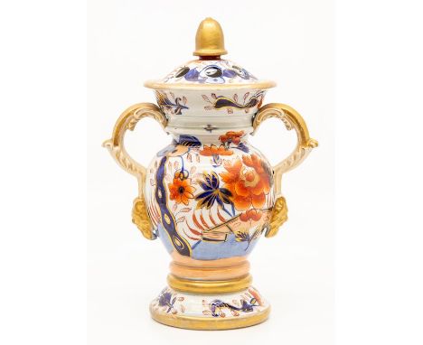 A Mason's Ironstone pot pourri vase and cover, circa 1820, of baluster form with twin scroll and mask handles picked out in g