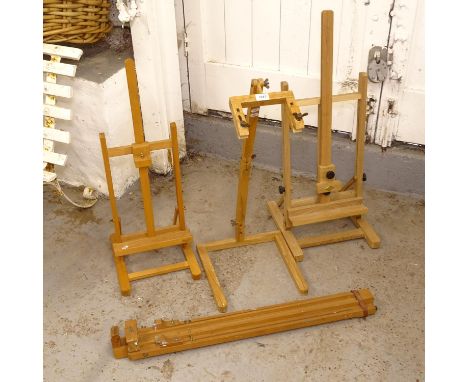 A Daler-Rowley table-top easel, an Italian beech table-top easel, and 2 others (4) 