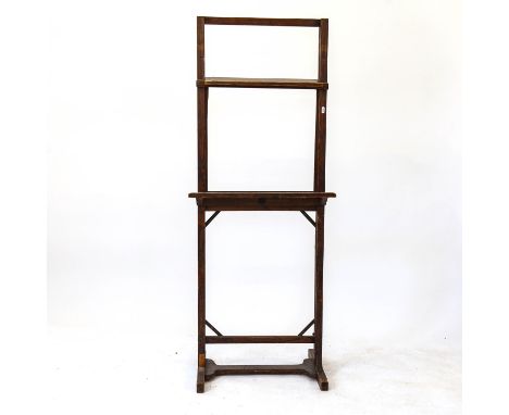 A Vintage stained pine adjustable artist's easel, W53cm 