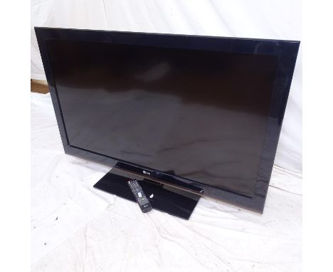 An LG 42" flat screen television with remote (model no. 42LK45OU), GWO 