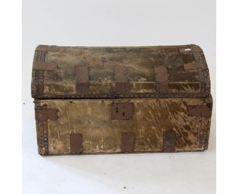 A 19th century hide-covered dome-top trunk, initialled EW, with strapwork, W72cm, H40cm, D44cm 