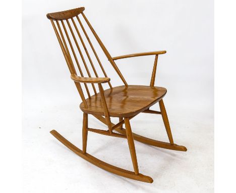 An elm-seated and beech stick-back rocking chair, and an Edwardian rush-seated low armchair (2) 