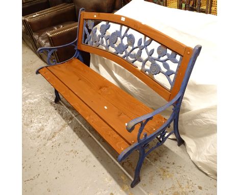 A blue painted wrought-iron garden bench, with panelled back, L127cm 