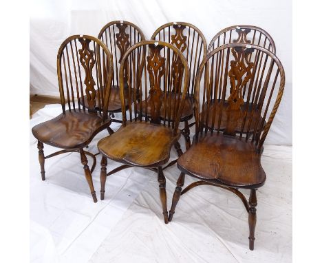 A set of 6 oak and elm-seated stick-back dining chairs, with crinoline stretchers 