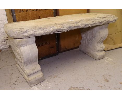 A concrete 3-section garden bench, on scrolled supports, L100cm, H44cm 