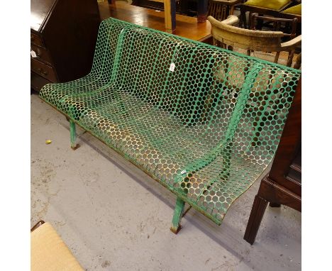 A painted and pierced metal garden bench, W146cm 