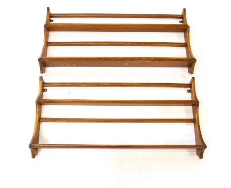 A pair of Ercol elm hanging plate racks, W97cm, H50cm 