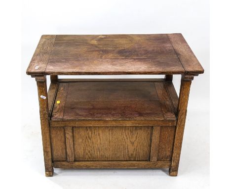 A small panelled oak monk's bench, W77cm, H65cm, D40cm 