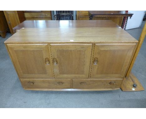 An Ercol Golden Dawn sideboard
