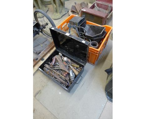 A tool box and tools, cast iron drain hoppers, etc.