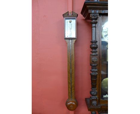 A mahogany stick barometer