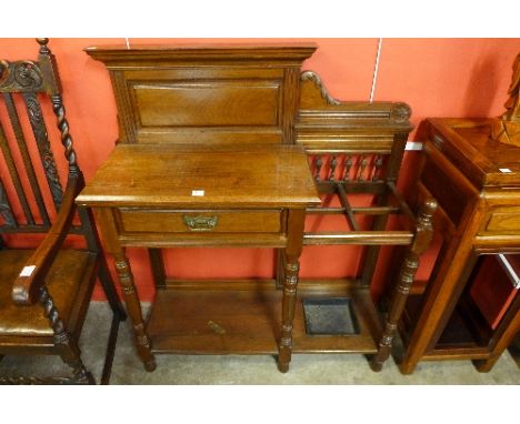 A Victorian oak stick stand