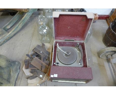 A McMichael record player and a box of wooden planes