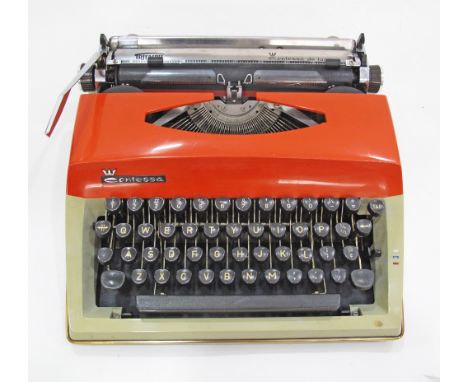 A Dutch Triumph Contessa de Luxe typewriter with orange cover, 33X32X10cm