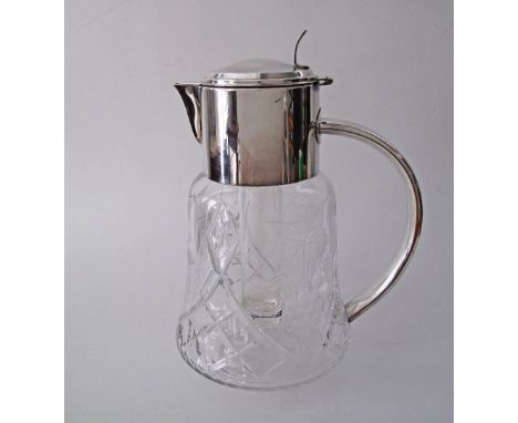 A German Wilhelm Wolff silver plated mounted crystal pitcher / claret jug,  carved and engraved with geometric motifs and vin