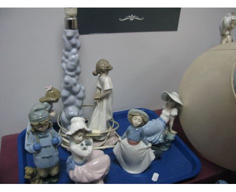 A Nao Pottery Table Lamp as a Girl by Tree, five Nao figurines:- One Tray