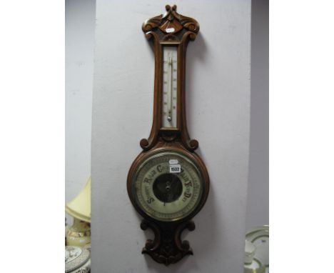 An Early XX Century Oak Cased Banjo Barometer, with thermometer to neck, 82cm high.