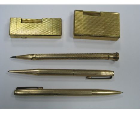A Vintage Dunhill Lighter, allover engine turned; together with a Dupont lighter, two propelling pencils and a pen.