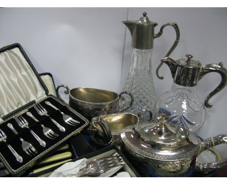 An Early XX Century Three Piece Electroplated Tea Service, of oval form with engraved decoration of foliate scrolls and ribbo