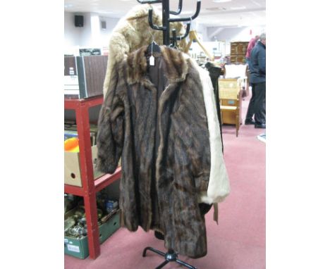 Four Coney Fur Jackets, in various shades; a full length mink coat, a brown reverse sheepskin coat and a pair of brown suede 
