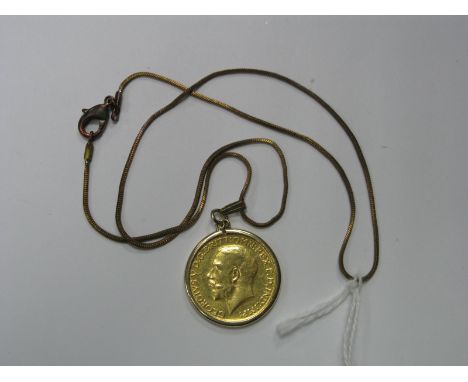 A George V Sovereign, 1911, loose (?) set in 9ct gold pendant mount, on a fine chain.