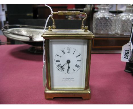 French Made Brass Carriage Clock, with bevelled glass panels, and Alexander Clark, London E.C to enamelled dial. 