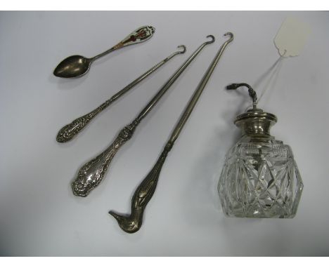 A Cut Glass Dressing Table Scent Bottle, with engine turned top stamped "Sterling", hallmarked silver handled button hooks, a