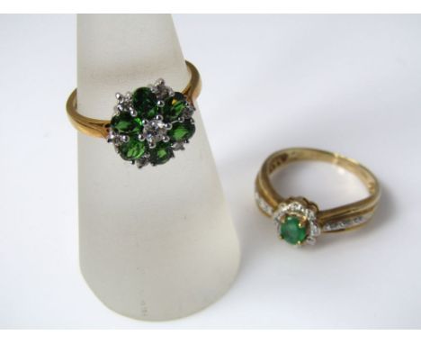 An 18ct flower head ring set with 6 green garnets and seven diamonds, size M and a 9ct ring with central emerald and cubic zi
