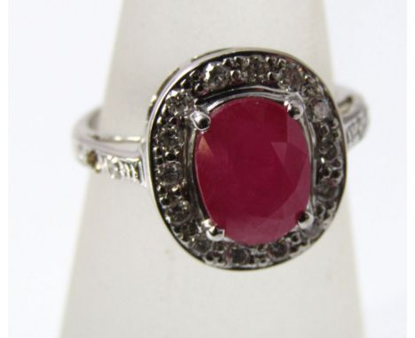 An 18ct white gold pink ruby and diamond ring