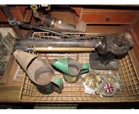 A vintage number 25 Dunlop cast iron trolley jack together with a further Shelley double lift jack, a Kismit lorry foot pump,