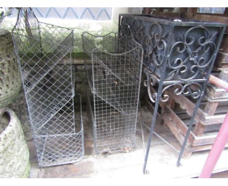 Two vintage wirework racks, slight variant in design but both with sloping shelves, together with a freestanding steel framed