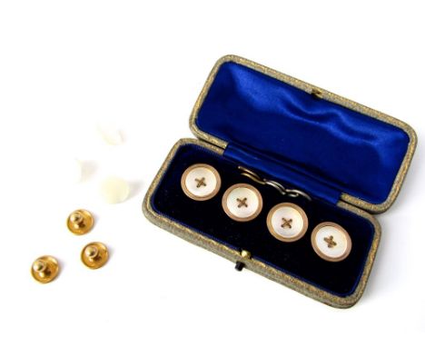 Cased set of four 9ct and mother of pearl dress buttons 7g in total; together with three 18ct cufflinks 2.2g and three mother