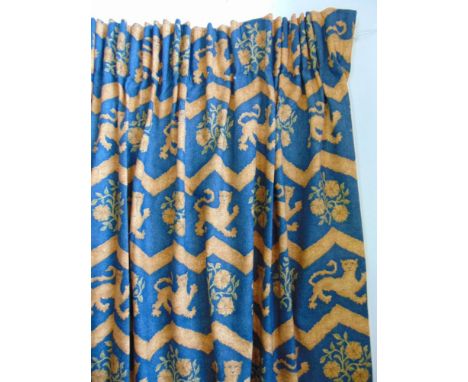Collection of seven curtains in blue Heraldic Lion pattern all lined with pencil pleat headings, approx size 4 curtains each 