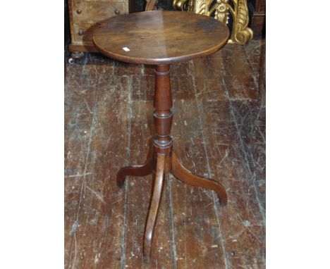 A Georgian fruitwood occasional table, the circular top 40cm in diameter raised on a tripod base 