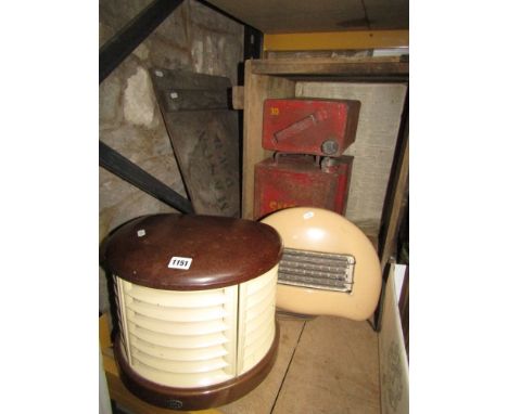 A vintage H M V electric heater of demi-lune form with Bakelite top and skirting, one other, three vintage Shell petrol cans 