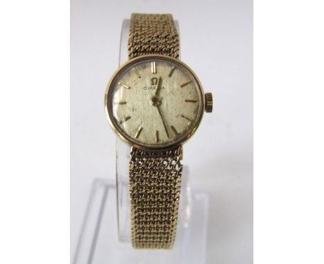 Vintage Omega 9ct ladies wristwatch with baton markers and woven link bracelet
