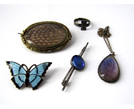 Three brooches to include an enamel butterfly, a silver butterfly wing example and similar necklace, together with a silver r