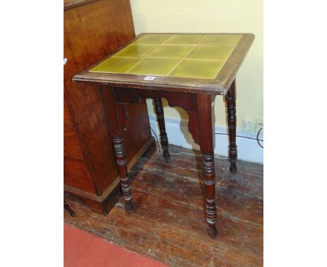 Late 19th century square cut occasional table raised on turned supports with ceramic tile inset