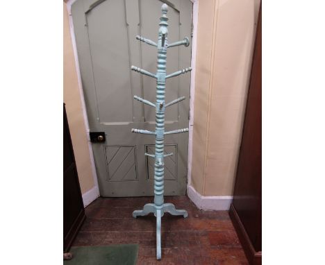 A late 19th century column hat/coat stand on tripod base and with later painted finish