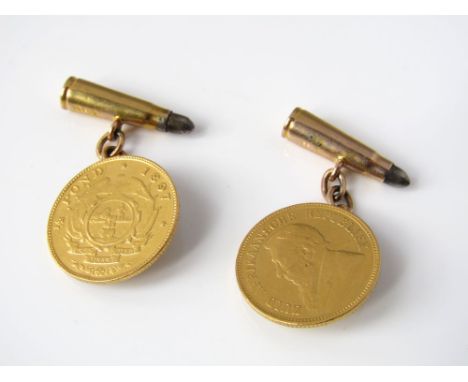 A pair of South African 1/2 Pond cufflinks, 1897 with 9ct gold bullet fittings, 10.5g