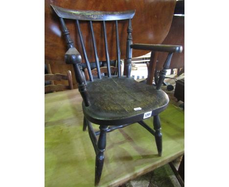 A late 19th century child's Windsor elbow chair with stick back and stencilled details