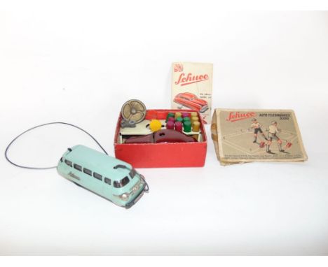 A vintage boxed Schuco remote controlled Varianto car with accessories and instruction leaflet, together with a further unbox