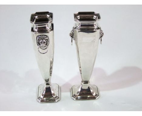 A pair of baluster faceted silver vases with lion mask ring handles, maker W & H