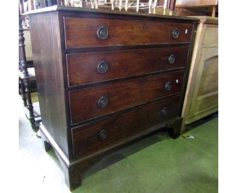 A 19th century mahogany chest of four long graduated drawers with brass ring handles raised on bracket supports, 100 cm wide