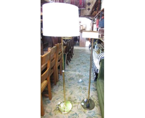 Two brass lamp standards with adjustable frames