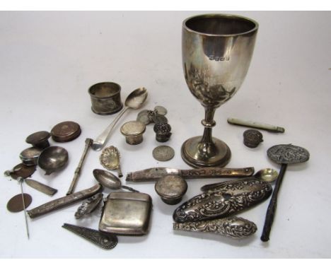 A box of various bijouterie silver and white metal to include silver goblet, napkin ring, vesta case and others