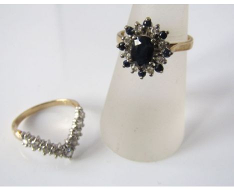 A 9ct gold sapphire and diamond cluster ring, size N, 3g and a further 9ct white stone ring, size N, 2g