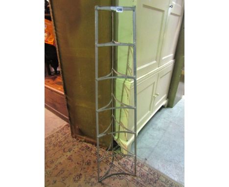 A vintage 7 tier saucepan tower