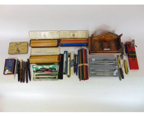 Collection of vintage pens and pencils to include Parker and others, together with a walnut standish, etc