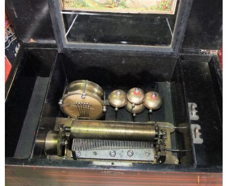 Impressive 19th century music box, playing on eight airs, the hinged lid enclosing an interior fitted with four bells and a d